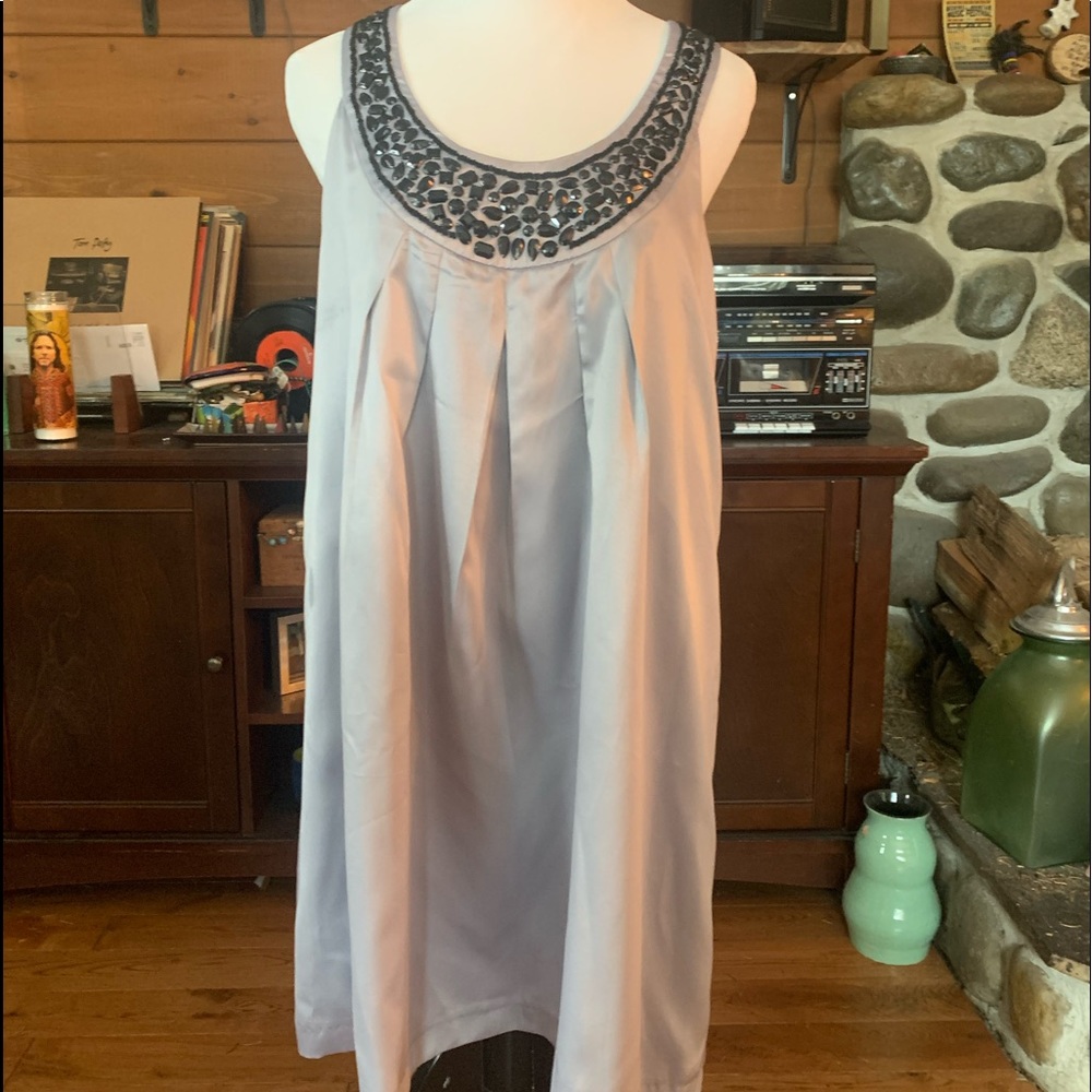 Forever 21 sleeveless silver/grey mini dress with black beading detail. Sz M.